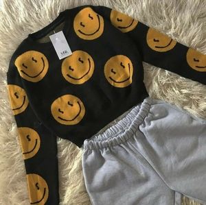Smiley face woolen round neck crop tee
